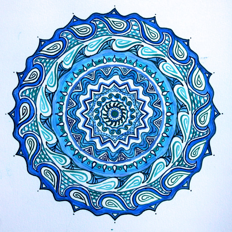 hand drawn pen and ink mandala with waves